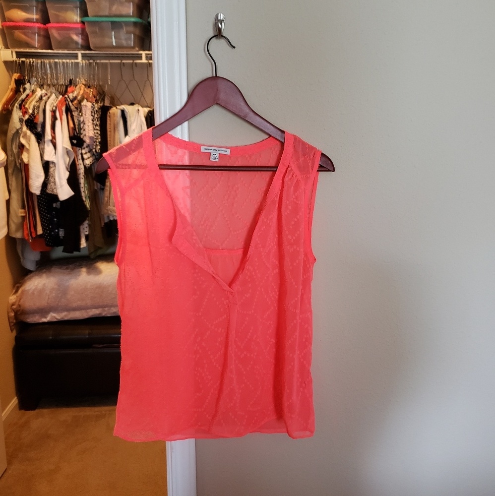 Hot peach colored top
